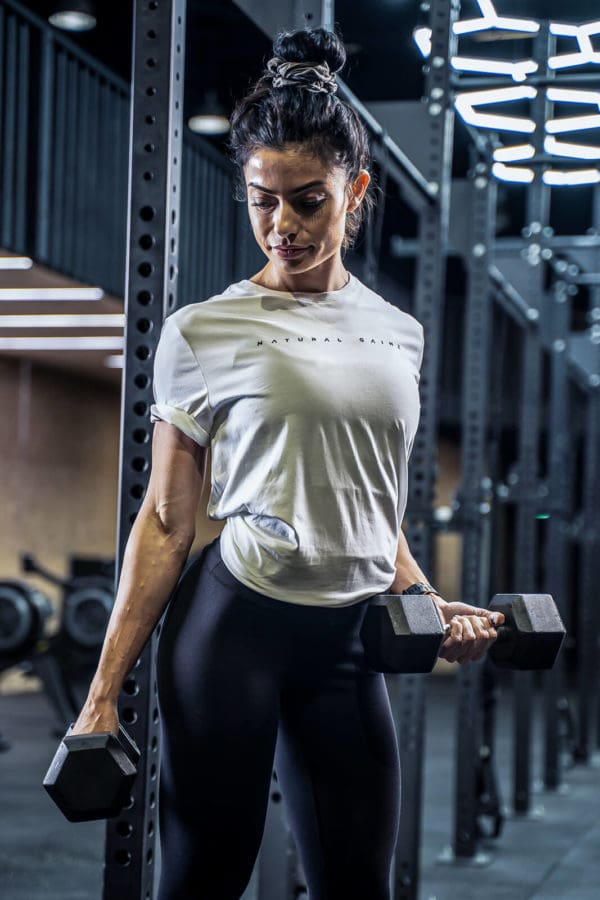 Women wearing white YNF tshirt